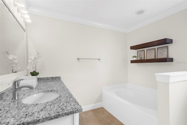 bathroom featuring tile patterned floors, a bathing tub, vanity, and ornamental molding