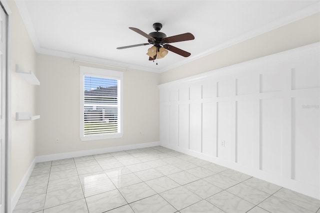 unfurnished room featuring ceiling fan, light tile patterned floors, and crown molding