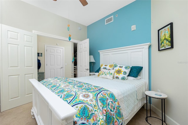 carpeted bedroom featuring ceiling fan