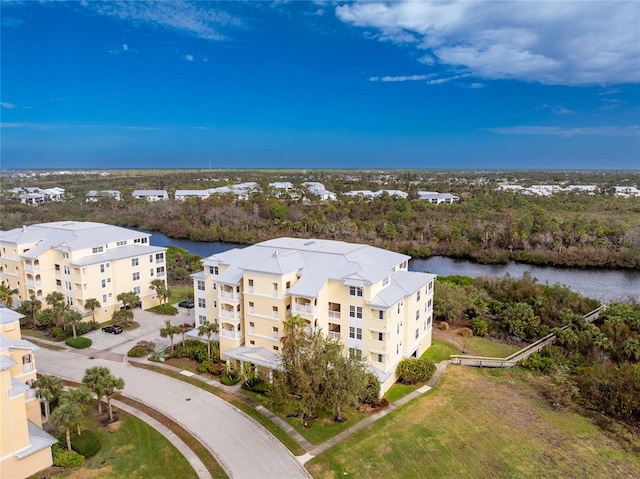 drone / aerial view featuring a water view