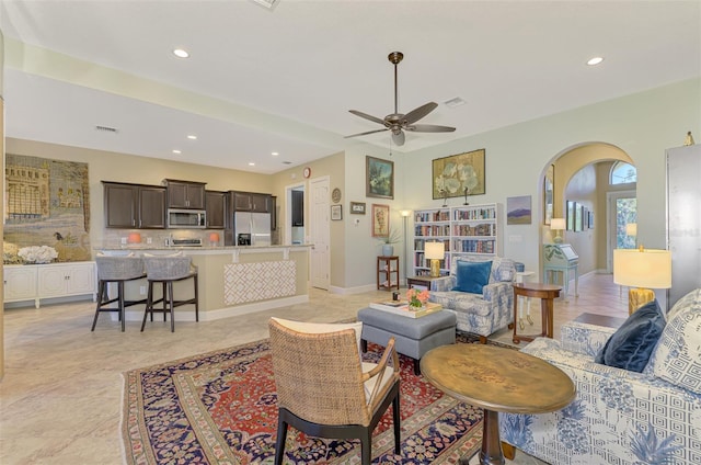 living room with ceiling fan