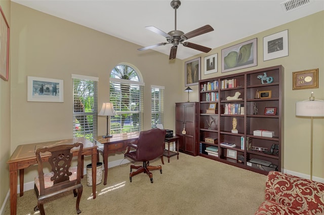 office space with ceiling fan and carpet floors