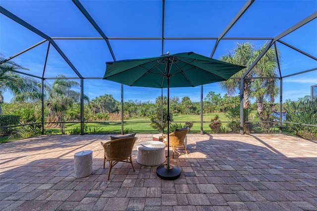 view of patio / terrace with a lanai