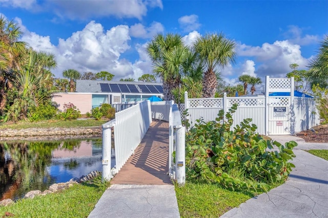 view of home's community featuring a water view