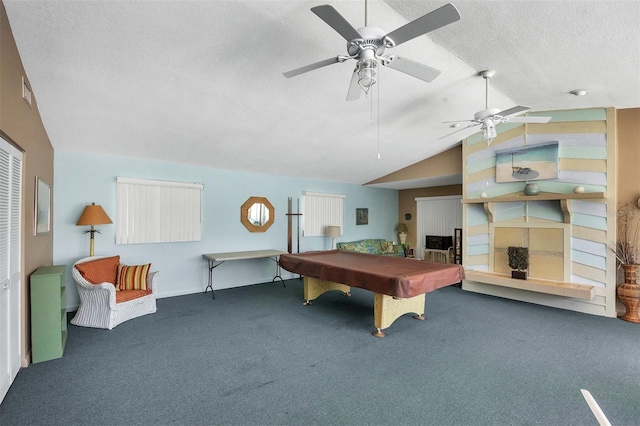 playroom with ceiling fan, billiards, a textured ceiling, lofted ceiling, and dark carpet