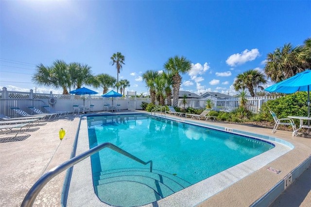 view of swimming pool featuring a patio