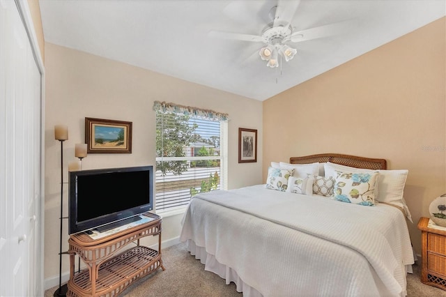 bedroom with light carpet and ceiling fan