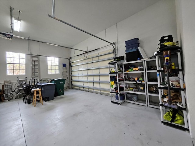 garage featuring a garage door opener