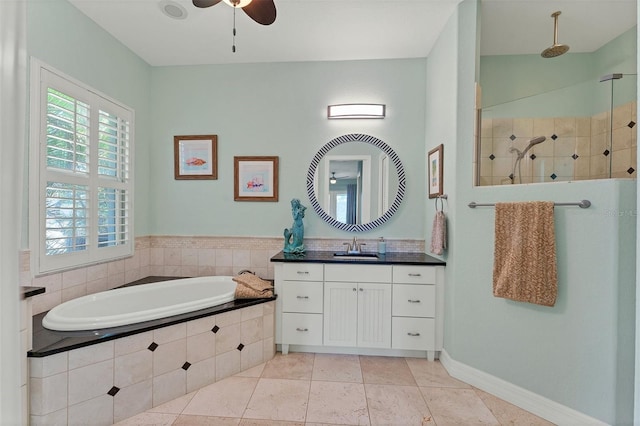 bathroom with ceiling fan, tile patterned flooring, independent shower and bath, and vanity