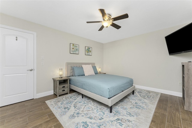 bedroom featuring wood-type flooring and ceiling fan