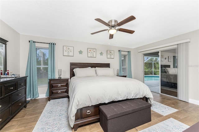 bedroom with ceiling fan, access to exterior, and light hardwood / wood-style flooring