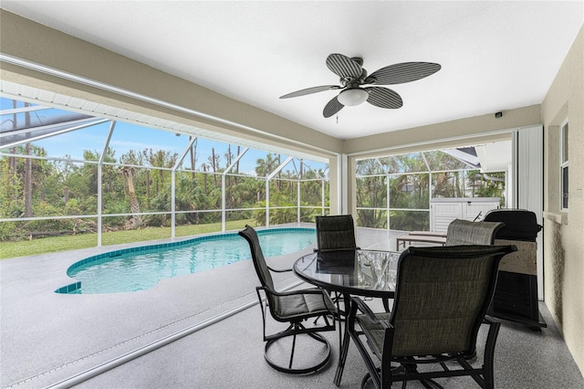 view of pool with ceiling fan