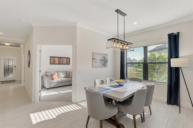 dining room with crown molding