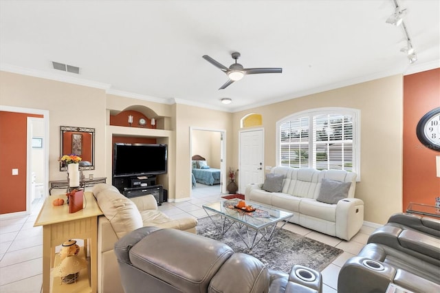 living room featuring ceiling fan, light tile patterned floors, rail lighting, and ornamental molding