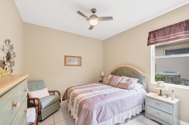 bedroom featuring light tile patterned floors and ceiling fan