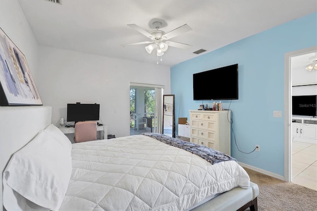 bedroom featuring access to exterior, ceiling fan, and light carpet