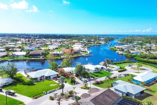 drone / aerial view featuring a water view