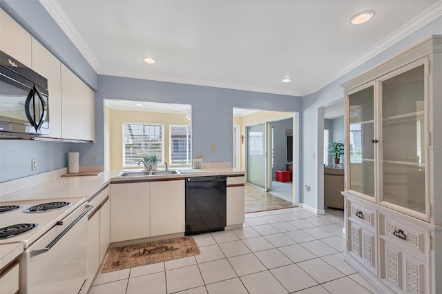 kitchen featuring crown molding, sink, light tile patterned flooring, and black appliances