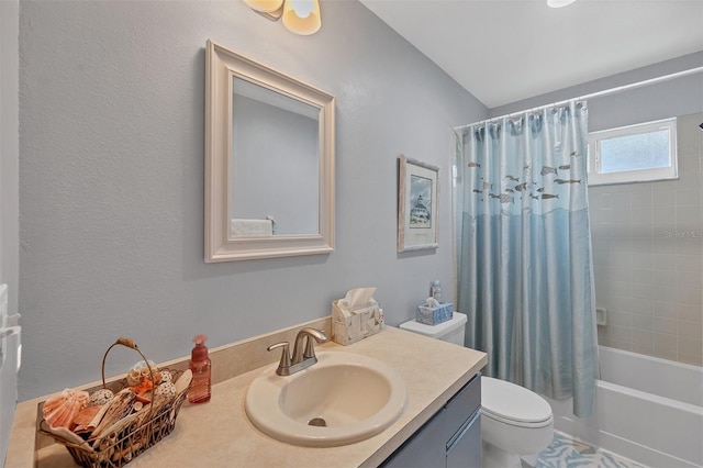 full bathroom featuring vanity, shower / bathtub combination with curtain, lofted ceiling, and toilet