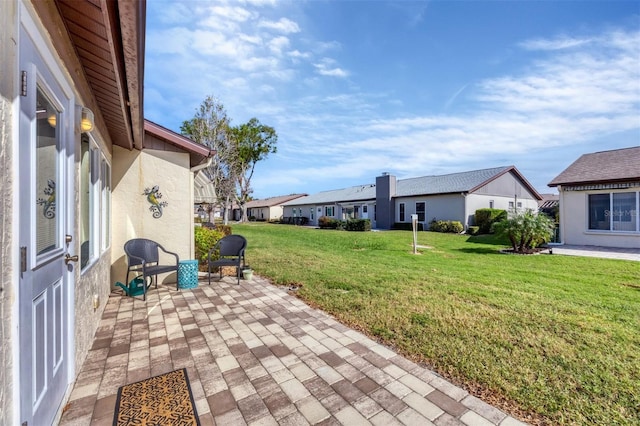 view of yard featuring a patio area