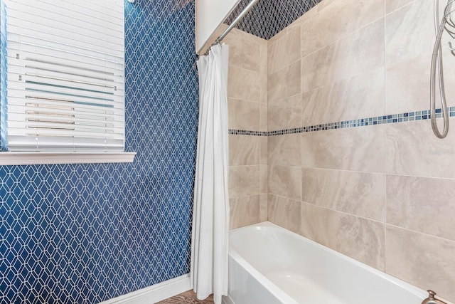 full bathroom featuring shower / tub combo with curtain