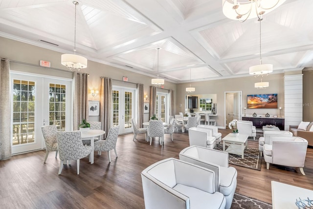 interior space featuring dark wood-style floors, french doors, and a notable chandelier