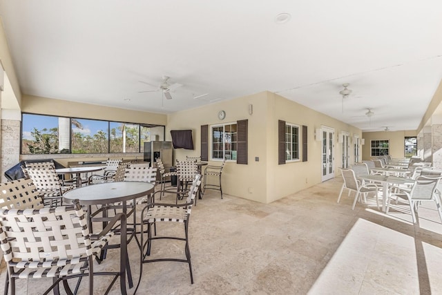 dining room featuring ceiling fan