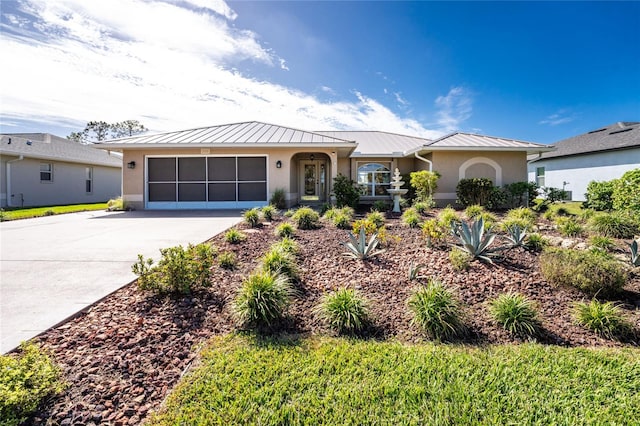 ranch-style home featuring a garage