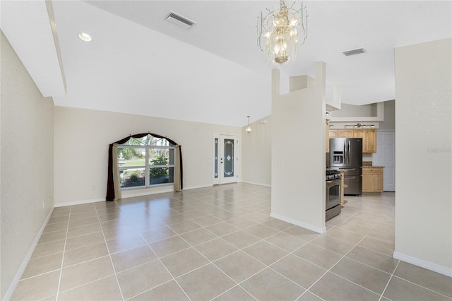 unfurnished living room featuring light tile patterned flooring, lofted ceiling, and a chandelier