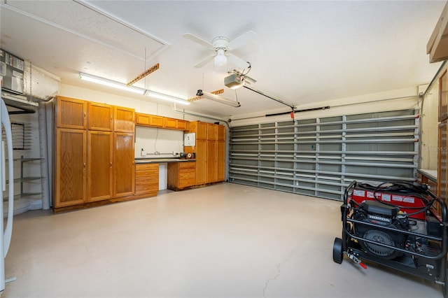 garage featuring ceiling fan and a garage door opener