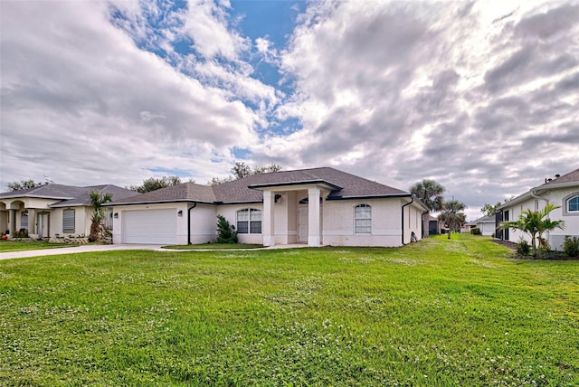 view of front of house with a garage and a front yard