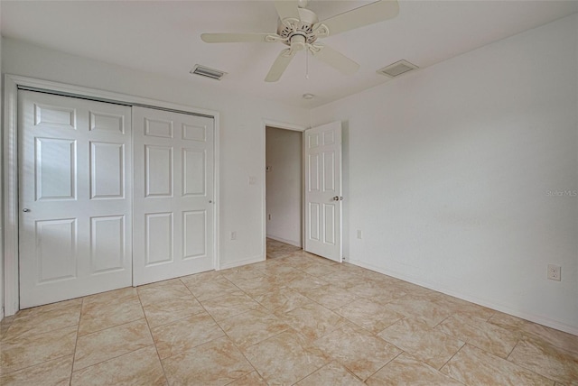 unfurnished bedroom featuring a closet and ceiling fan