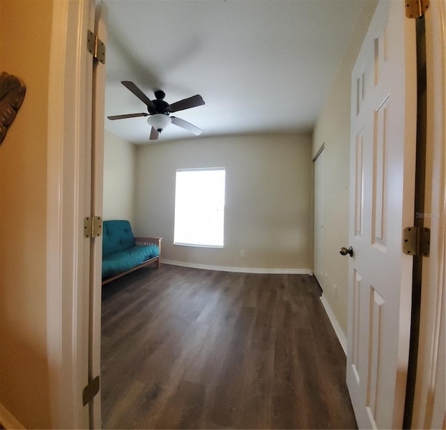 interior space featuring dark hardwood / wood-style floors and ceiling fan