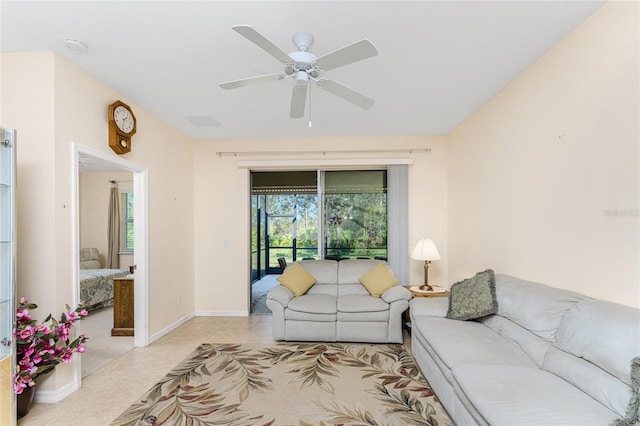 living room with light carpet and ceiling fan