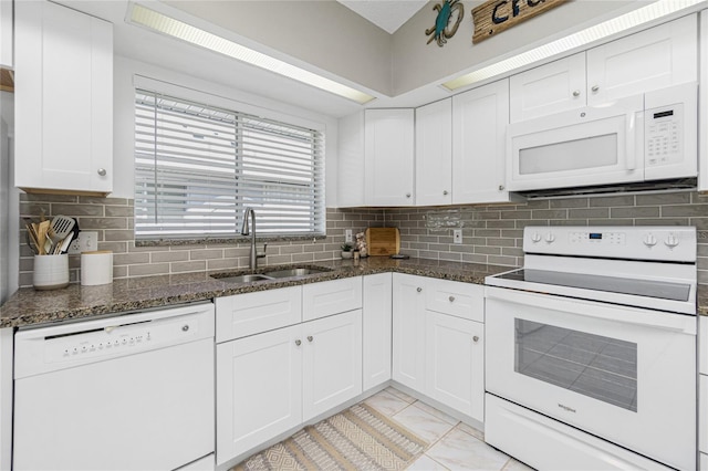 kitchen featuring white cabinets, white appliances, and sink