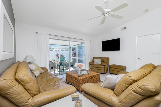 living room featuring ceiling fan and vaulted ceiling