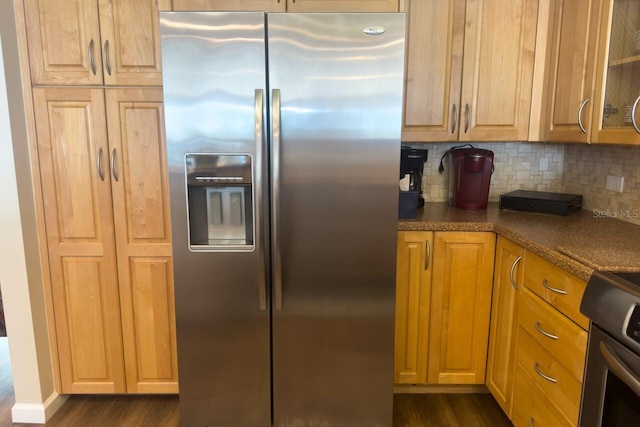 kitchen with decorative backsplash, stainless steel appliances, and dark wood-type flooring