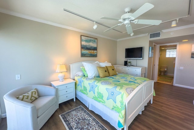 bedroom featuring ceiling fan, dark hardwood / wood-style flooring, crown molding, and track lighting