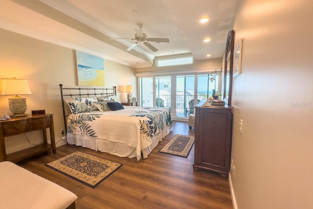 bedroom with a raised ceiling, crown molding, ceiling fan, access to exterior, and dark hardwood / wood-style flooring