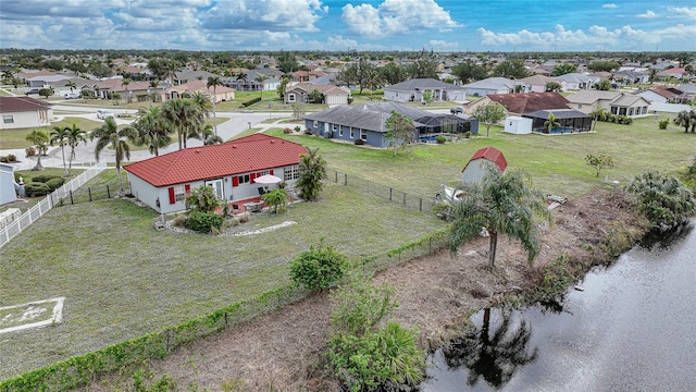 drone / aerial view with a water view