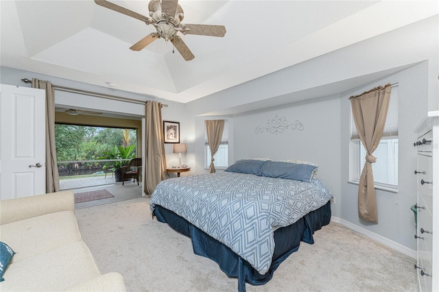 bedroom featuring access to exterior, baseboards, lofted ceiling, carpet flooring, and a ceiling fan