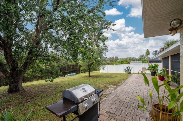 view of yard with a patio area and a fenced backyard