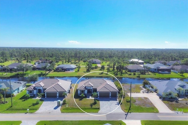 birds eye view of property featuring a water view