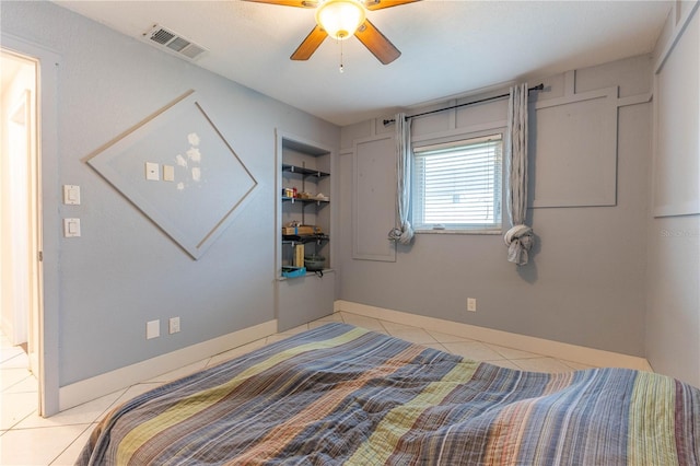 bedroom featuring ceiling fan and light tile patterned floors