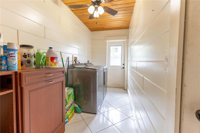 clothes washing area with independent washer and dryer, ceiling fan, wooden ceiling, and light tile patterned flooring