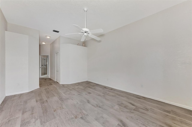 unfurnished room featuring ceiling fan and light hardwood / wood-style floors