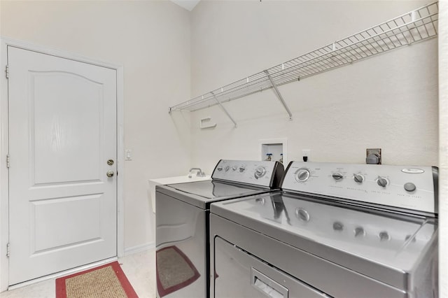 laundry area featuring washing machine and dryer