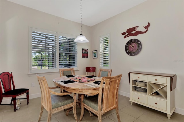 tiled dining area with plenty of natural light