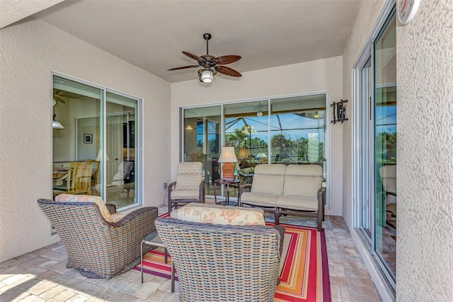 view of patio / terrace featuring ceiling fan