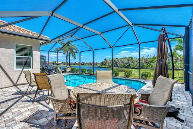 view of pool with a lanai and a patio area